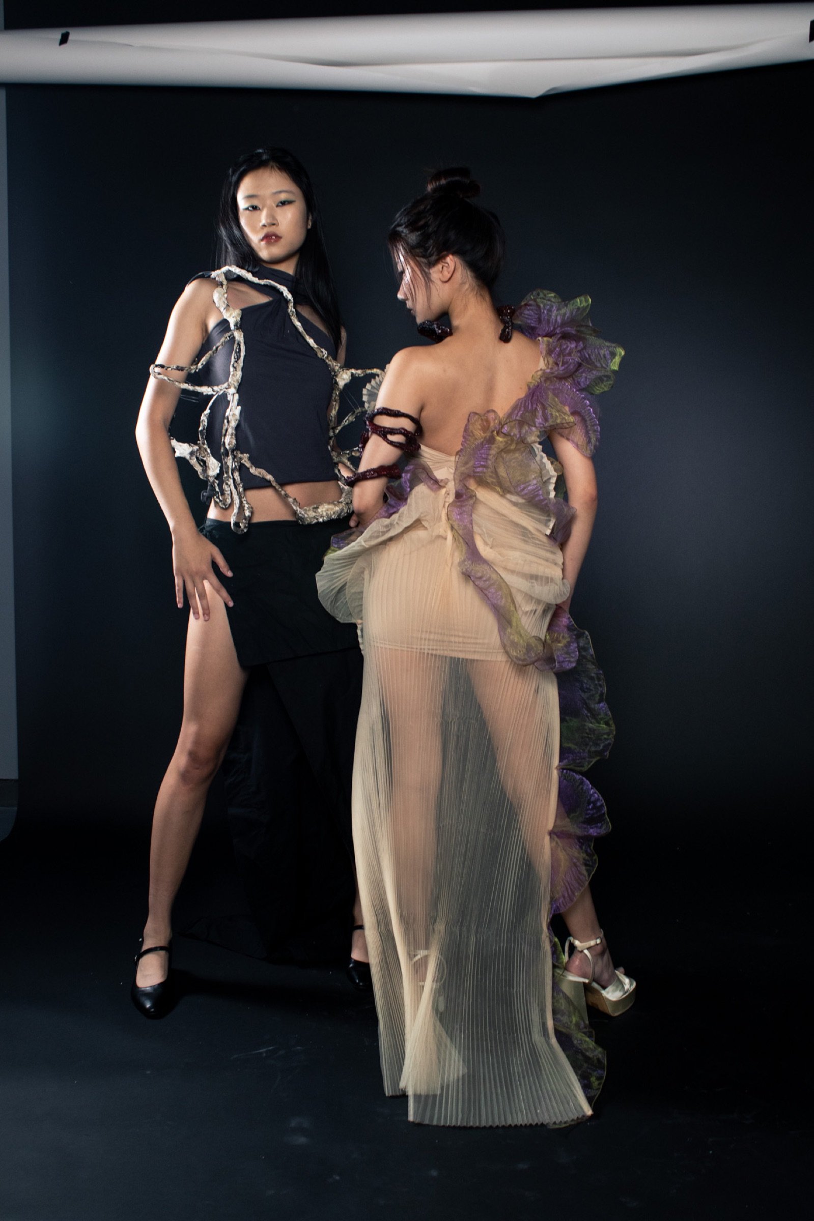 Studio portrait of two Balance looks